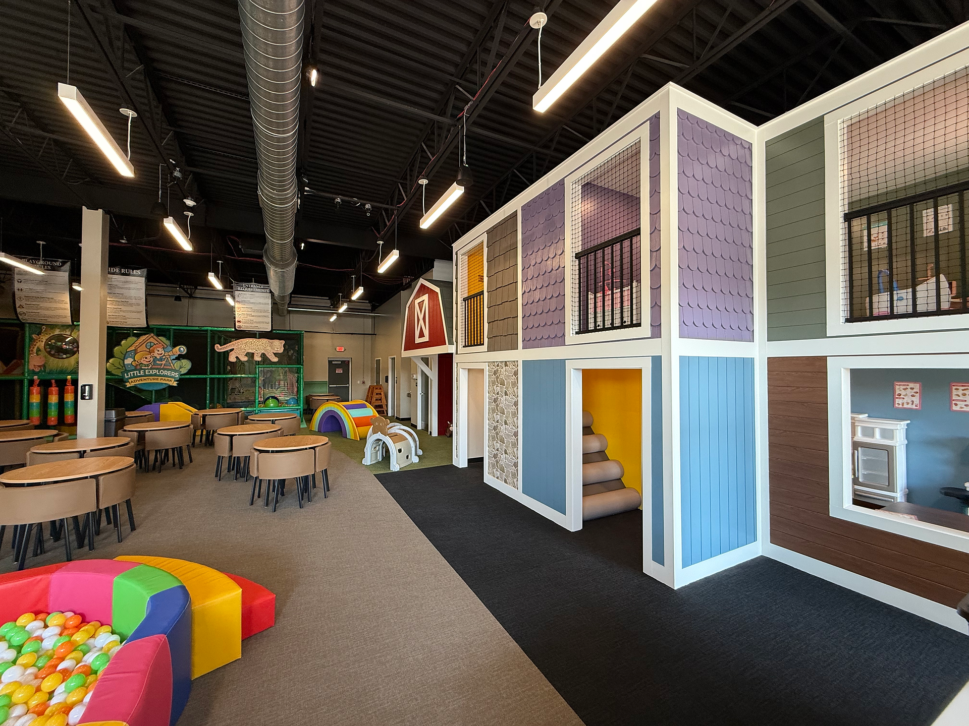 indoor play structure and sitting area at little explorers